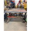 Image 1 : Moving welding table with metal scraps and etc. 48"x25"x35" Tall (Vise and Grinder not included)