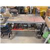 Image 6 : Moving welding table with metal scraps and etc. 48"x25"x35" Tall (Vise and Grinder not included)