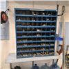 Image 1 : Sorted nuts and bolts in a wall rack