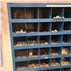 Image 2 : Sorted nuts and bolts in a wall rack