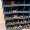 Image 5 : Sorted nuts and bolts in a wall rack