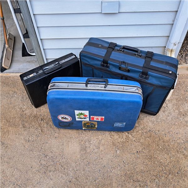 3 suit cases- sizes vary
