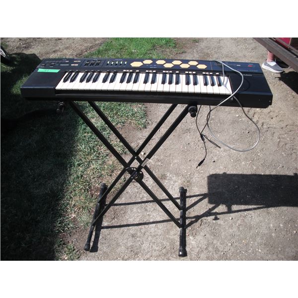 Casio CT-510 keyboard with stand - working, no power cable, take 6D batteries or DC 9V power cable