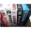 Image 2 : lot of VHS tapes and racquet
