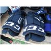 Image 3 : assorted hockey equipment - nike skates (sz 9), nike pants (senior small), bag, etc. - some street h