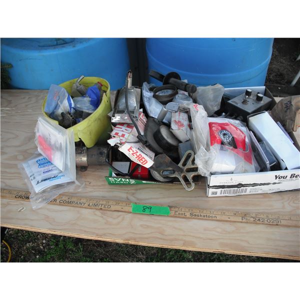 assorted tools and hardware - gease caps, oil pump, gear puller,foam marker monitor, Case replacemen