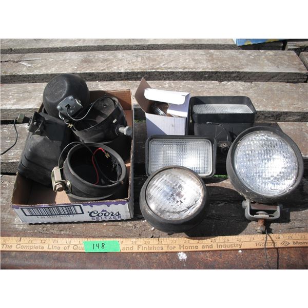 lot of assorted headlights and auxillary lights