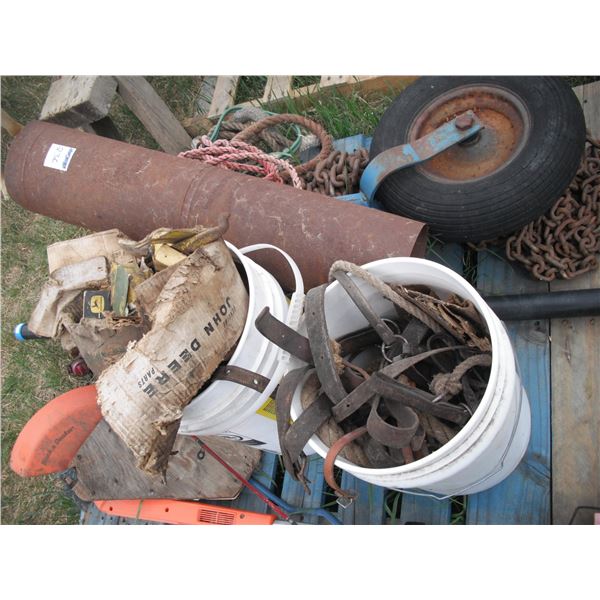 pallet lot - chains, fishing rod, weedwhacker, auger transport wheel, John Deere parts, etc.