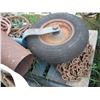 Image 2 : pallet lot - chains, fishing rod, weedwhacker, auger transport wheel, John Deere parts, etc.