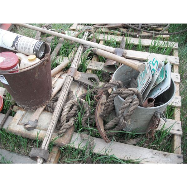pallet lot - assorted licence plates, hand tools, blacksmith leg vice, pickaxe, etc.