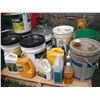 Image 1 : pallet lot - various partial oil jugs and pails - ATF, Engine oil, John Deer, Esso, etc.