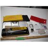 Image 1 : gun cleaning kit, trigger lock, bullet holder, etc.