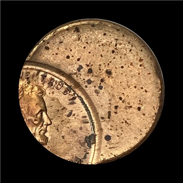 This is a 1984 Lincoln Cent with a mint error (off-center strike). UNCIRCULATED