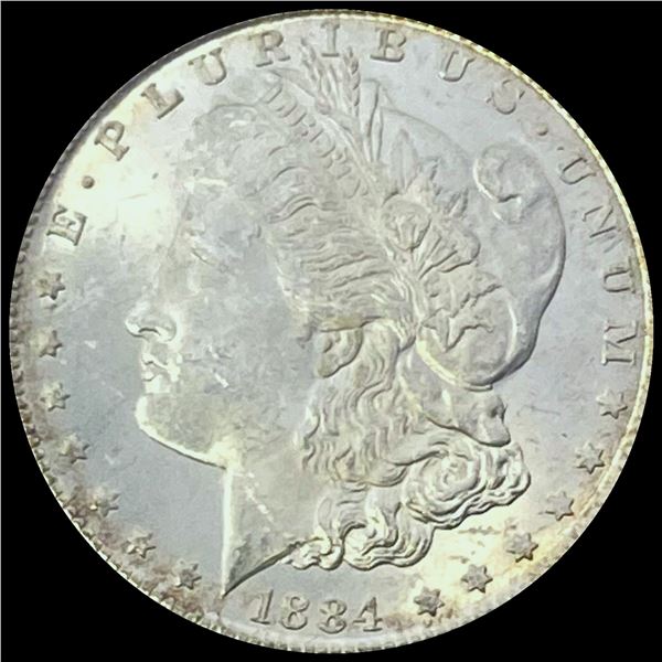 This is a 1884 Morgan Silver Dollar. SUPERB GEM BU