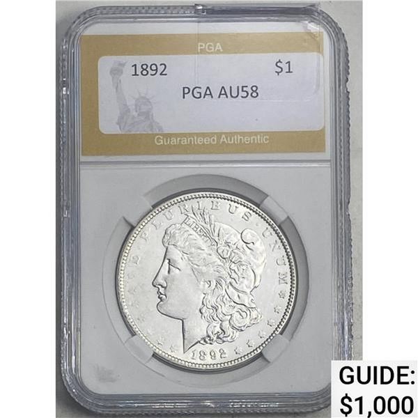 1892 Morgan Dollar PGA AU58