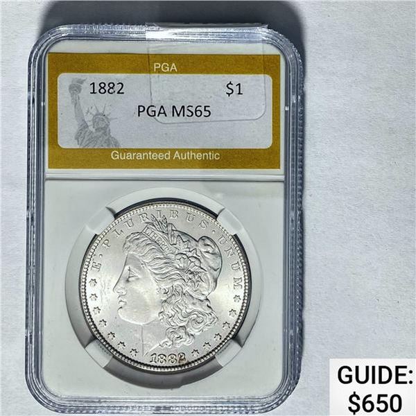 1882 Morgan Dollar PGA MS65 SILVER