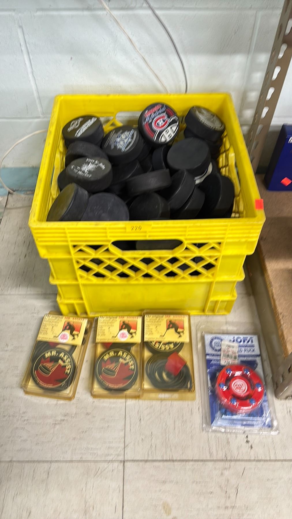 Line Speed Puck MILK CRATE OF HOCKEY PUCKS, 3 MR ASSIST HOCKEY PUCKS & A SPEED PUCK ...