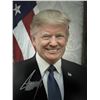 Image 1 : US President Donald Trump signed photo