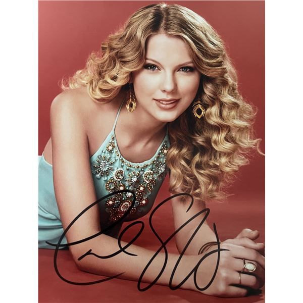 Taylor Swift signed acoustic guitar.  PSA DNA authenticated