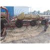 Image 4 : New Holland Inline 9 Wheel Hay Rake. Field