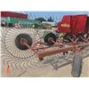 Image 6 : New Holland Inline 9 Wheel Hay Rake. Field