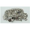 Image 1 : #1252 102 GRAMS STERLING SILVER 34 CHARM BRACELET