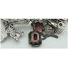 Image 2 : #1252 102 GRAMS STERLING SILVER 34 CHARM BRACELET