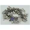 Image 1 : #1253 104 GRAMS STERLING SILVER 46 CHARM BRACELET