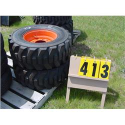 (2) 12-16.5 bobcat tires on rime