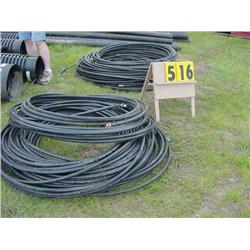 2 piles of plastic water pipe