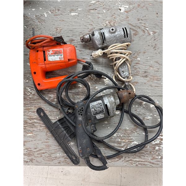 Two black and deckerdrills and one black and decker  jigsaw