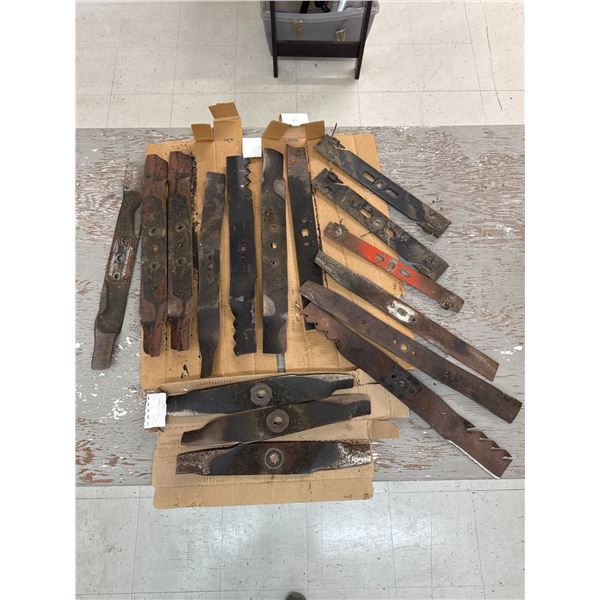 Large collection of lawn mower blades