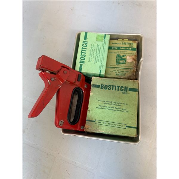 Stapler with three boxes of staples