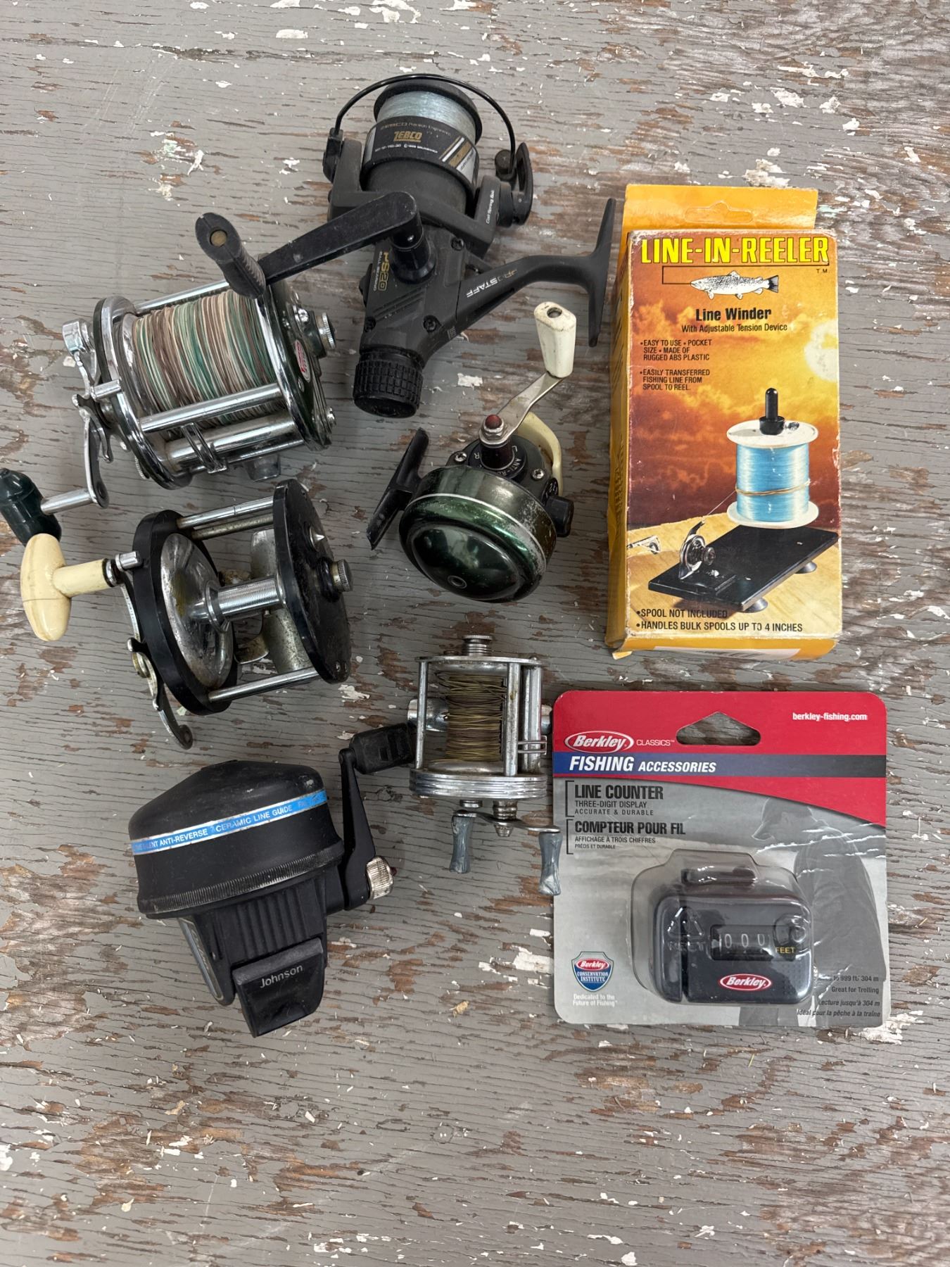 Six fishing reels , line counter and line winder
