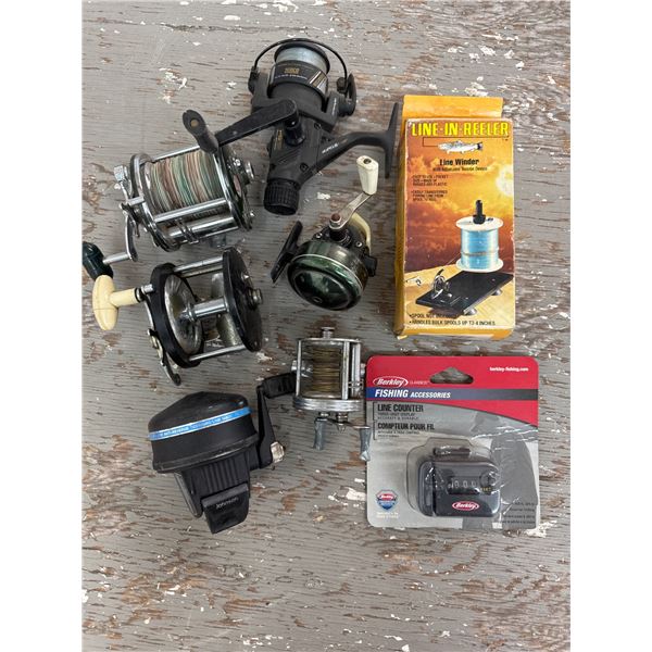Six fishing reels , line counter and line winder