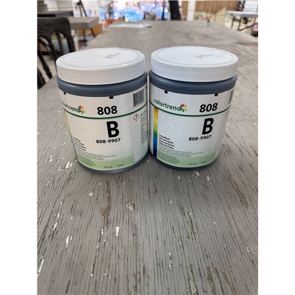 Two cans of lamp black paint