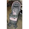 Image 1 : BABY TREND STROLLER, NEEDS A WASH