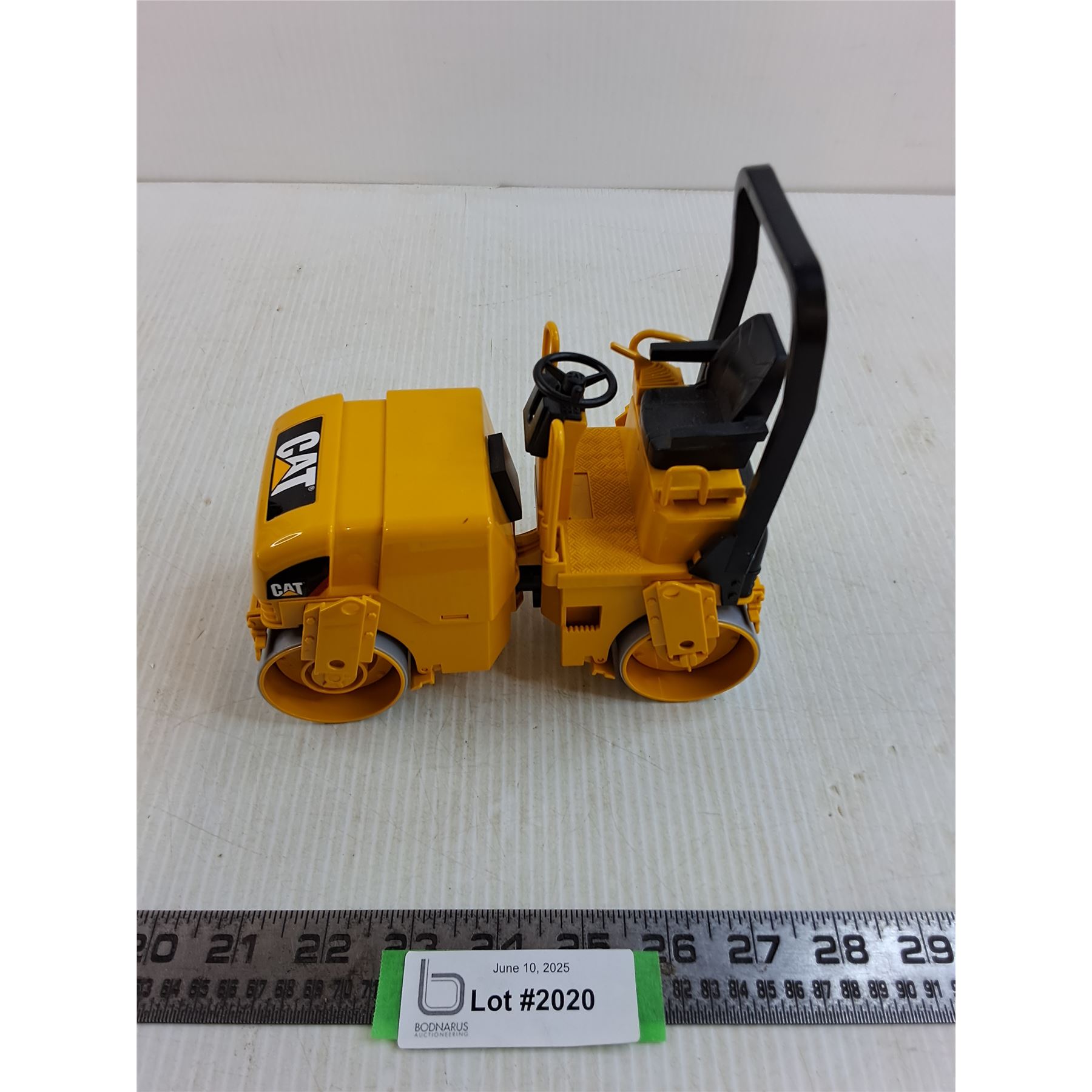 Pavement Packer Replica Caterpillar Pavement Packer - Bodnarus Auctioneering