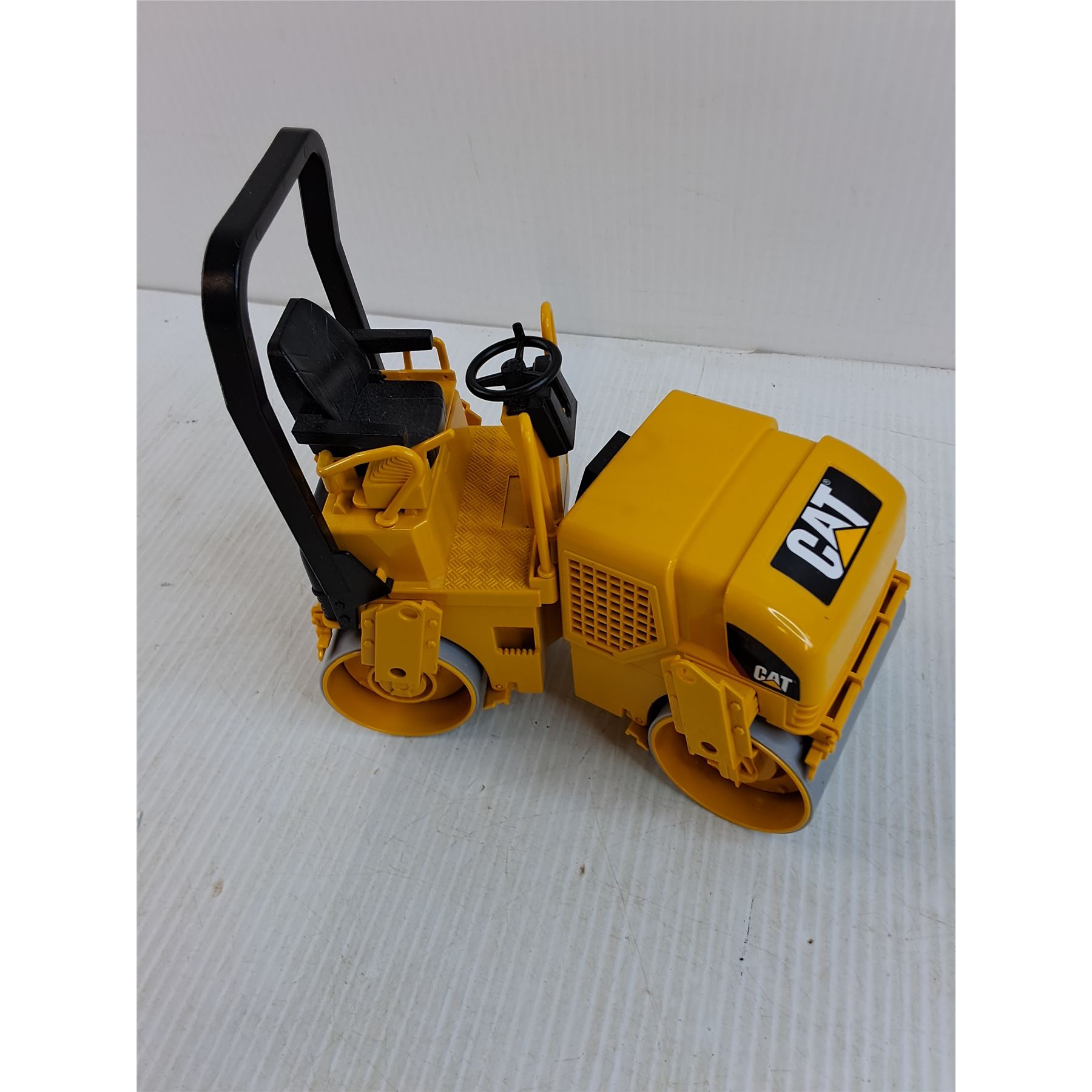Pavement Packer Replica Caterpillar Pavement Packer - Bodnarus Auctioneering