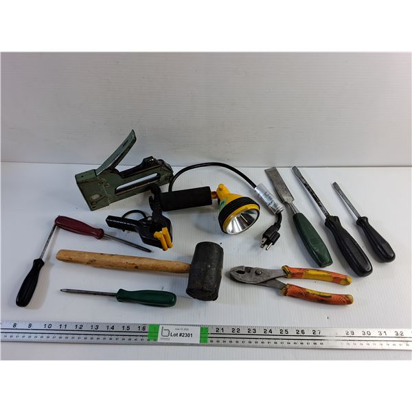 Stapler, Screwdrivers, Rubber Hammer, Pliers, Chisel and Clip On Flashlight