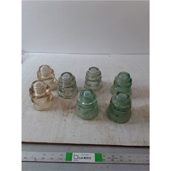 (7) Dominion Clear Glass Insulators ( some Turning Blue)