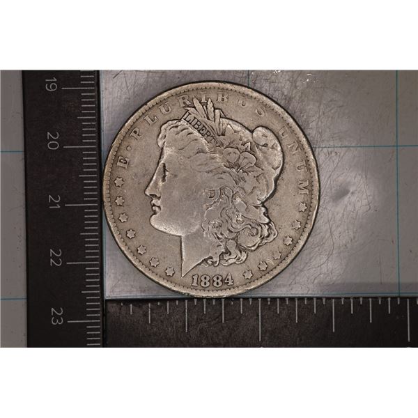 1884-O MORGAN SILVER DOLLAR IN HARD PLASTIC