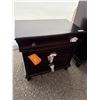 Image 1 : Dark Wood Three-Drawer Nightstand With Metal Pulls ( matches lot #7015)