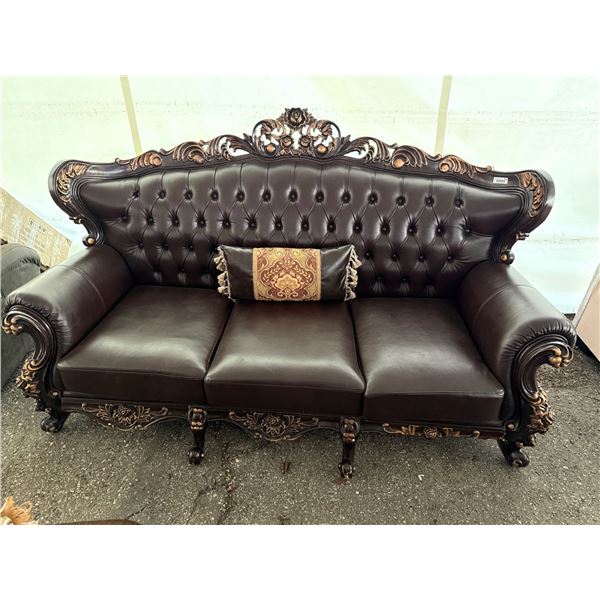 Carved Wood and Faux Leather Upholstered Three-Seater Sofa