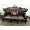 Image 1 : Carved Wood and Faux Leather Upholstered Three-Seater Sofa