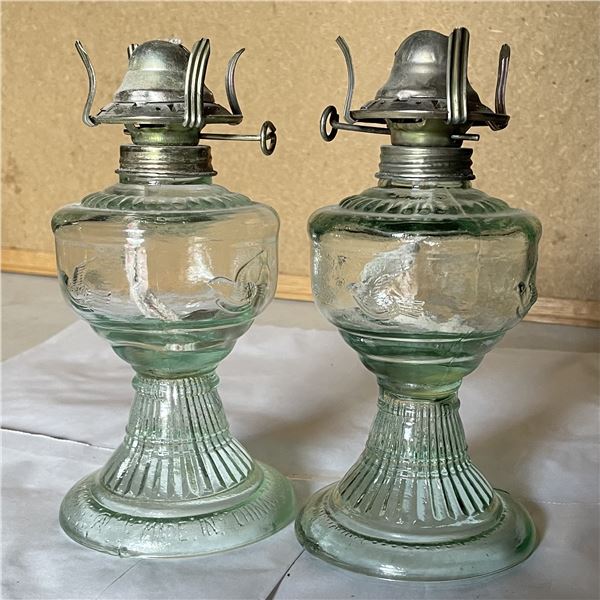 Pair of glass oil lamps 8” tall. No chimneys