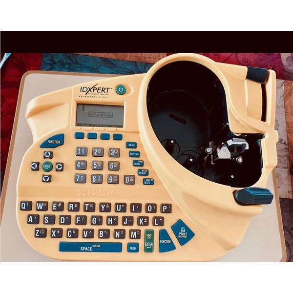 Brady IDEXPERT handheld printer with keyboard. Works with AA batteries.