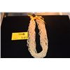 Image 1 : PUAMANA SHELL LEI, 12 STRAND, LIGHT YELLOW W/YELLOW RIBBON (APPROX 60")