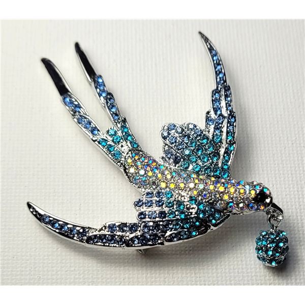 6) MULTI COLORED CRYSTAL STARLING BROOCH