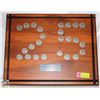 Image 1 : 25 CANADIAN 1976 DOLLAR COINS IN A WOOD PLAQUE